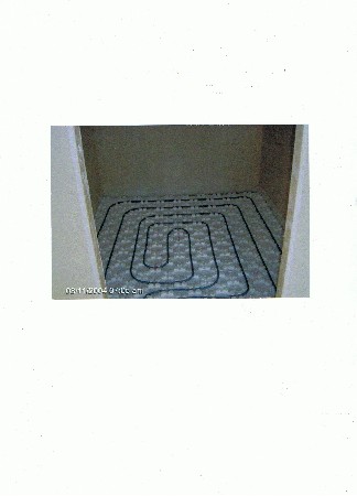 Réalisation d'un plancher Chauffant basse température reversible par tube PER 13/16 en partie chambre .